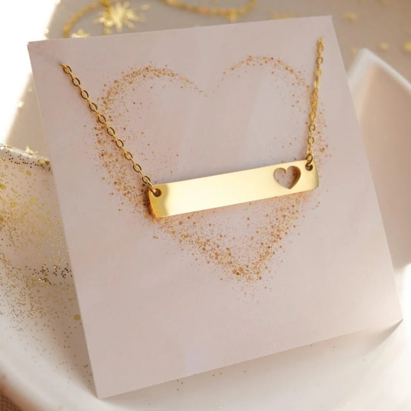Custom engraved heart cutout bar necklace in gold silver and rose gold stainless steel waterproof and hypoallergenic personalized gift for teens and couples
