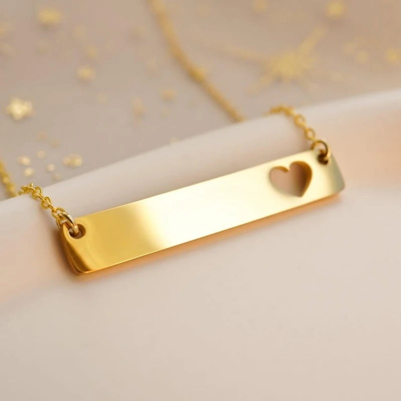 Custom engraved heart cutout bar necklace in gold silver and rose gold stainless steel waterproof and hypoallergenic personalized gift for teens and couples