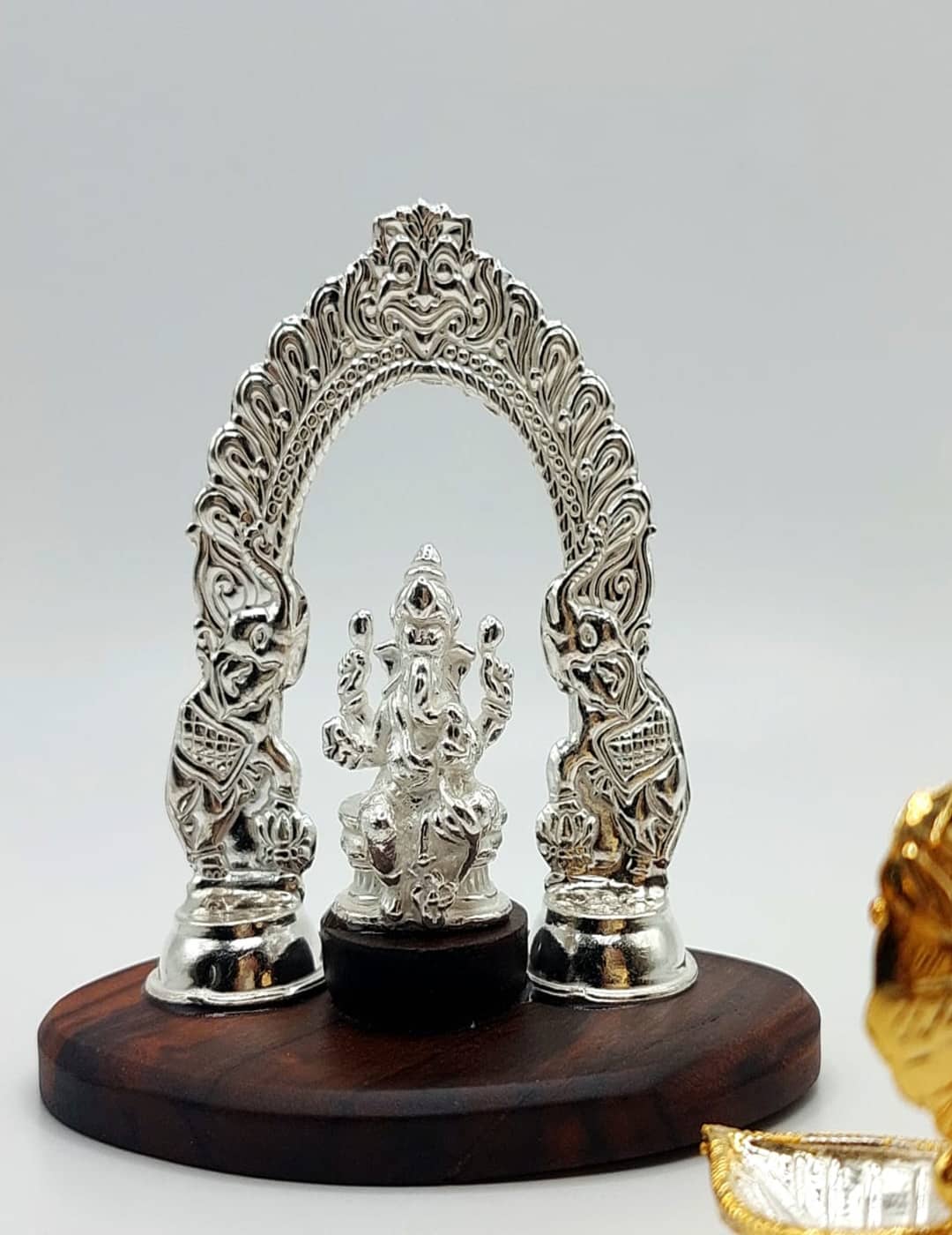 Ganesha Adorned With Elephant Arch