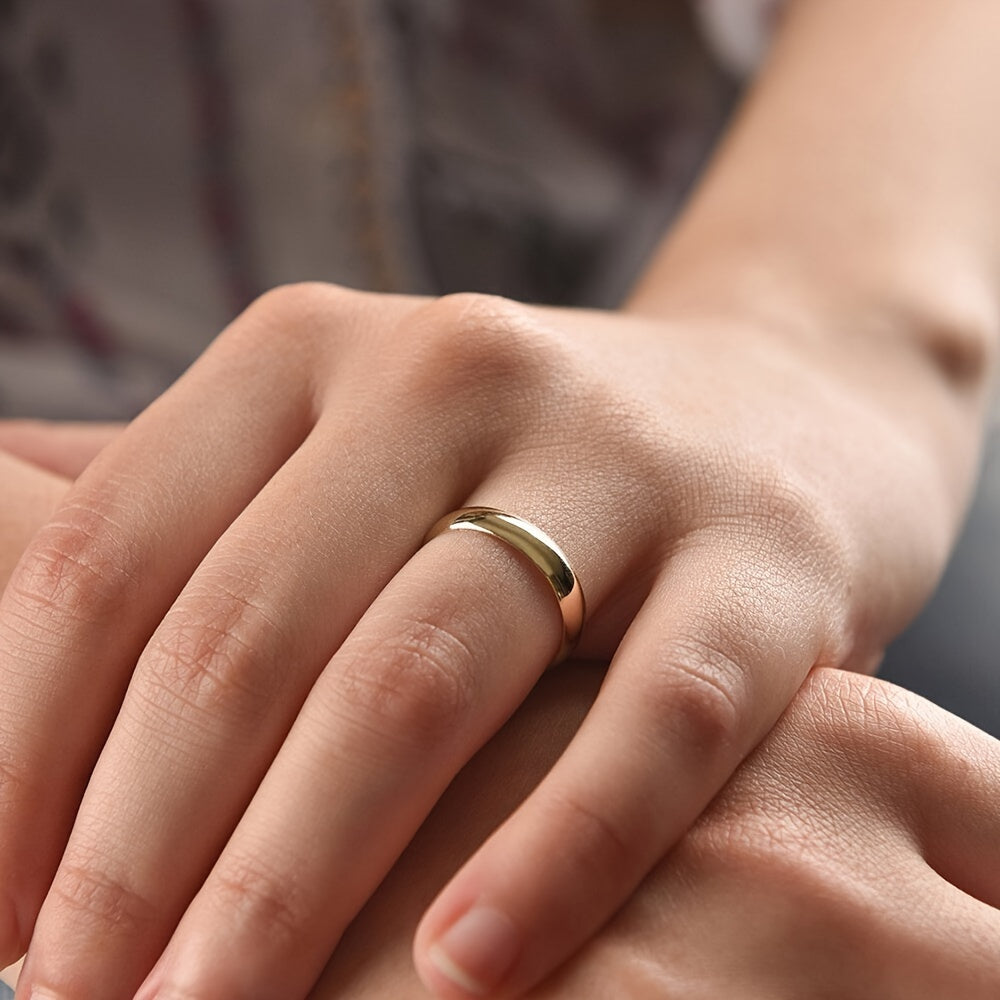 Minimalist polished gold band ring in 18K gold plated stainless steel waterproof and hypoallergenic premium stackable jewelry for teens and women in USA Canada