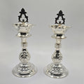 Pair of handcrafted real silver stand diyas with decorative backplates for puja room decor and luxury wedding return gifts