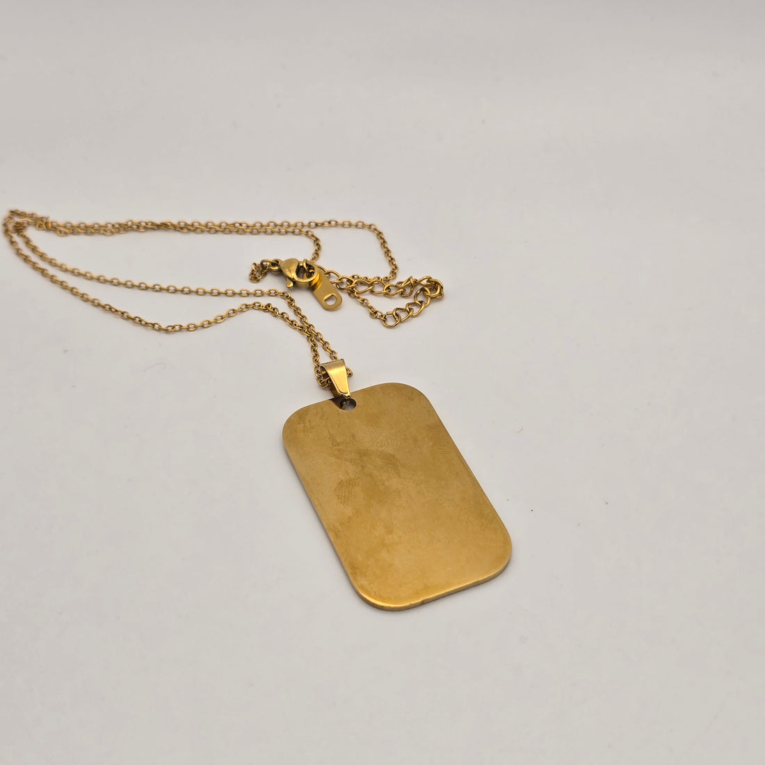 Custom text engraved dog tag necklace in 18K gold plated stainless steel waterproof and hypoallergenic premium personalized gift for men and teens in USA Canada