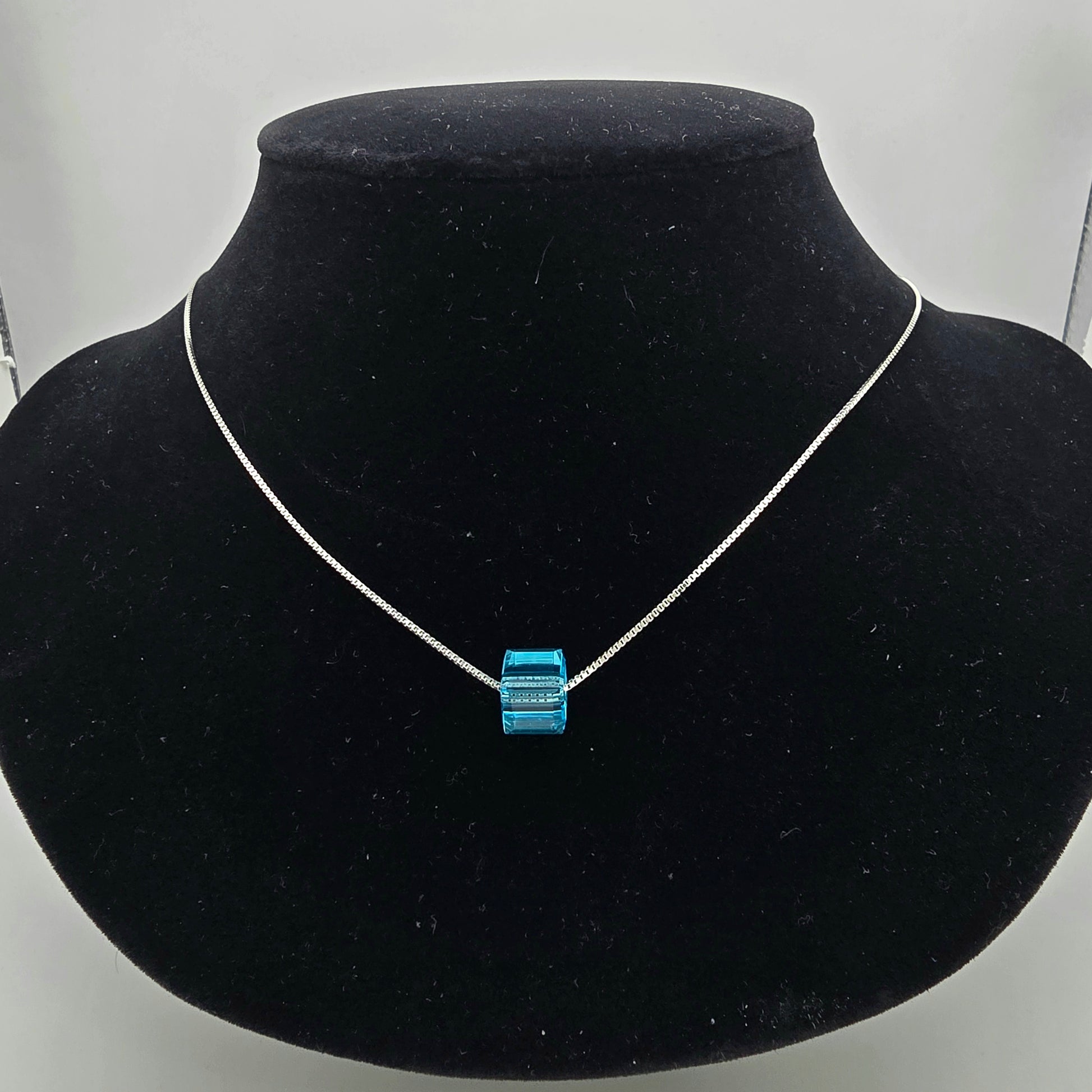 925 silver necklace for women featuring a minimalist vibrant blue cube slide pendant on a fine real silver box chain.